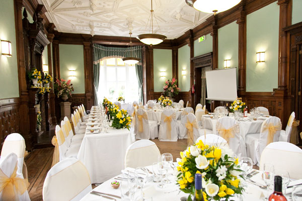 Ballroom with wedding table settings and decorations