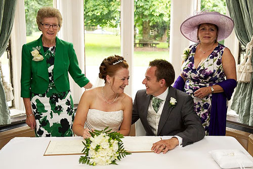 Couple signing the register